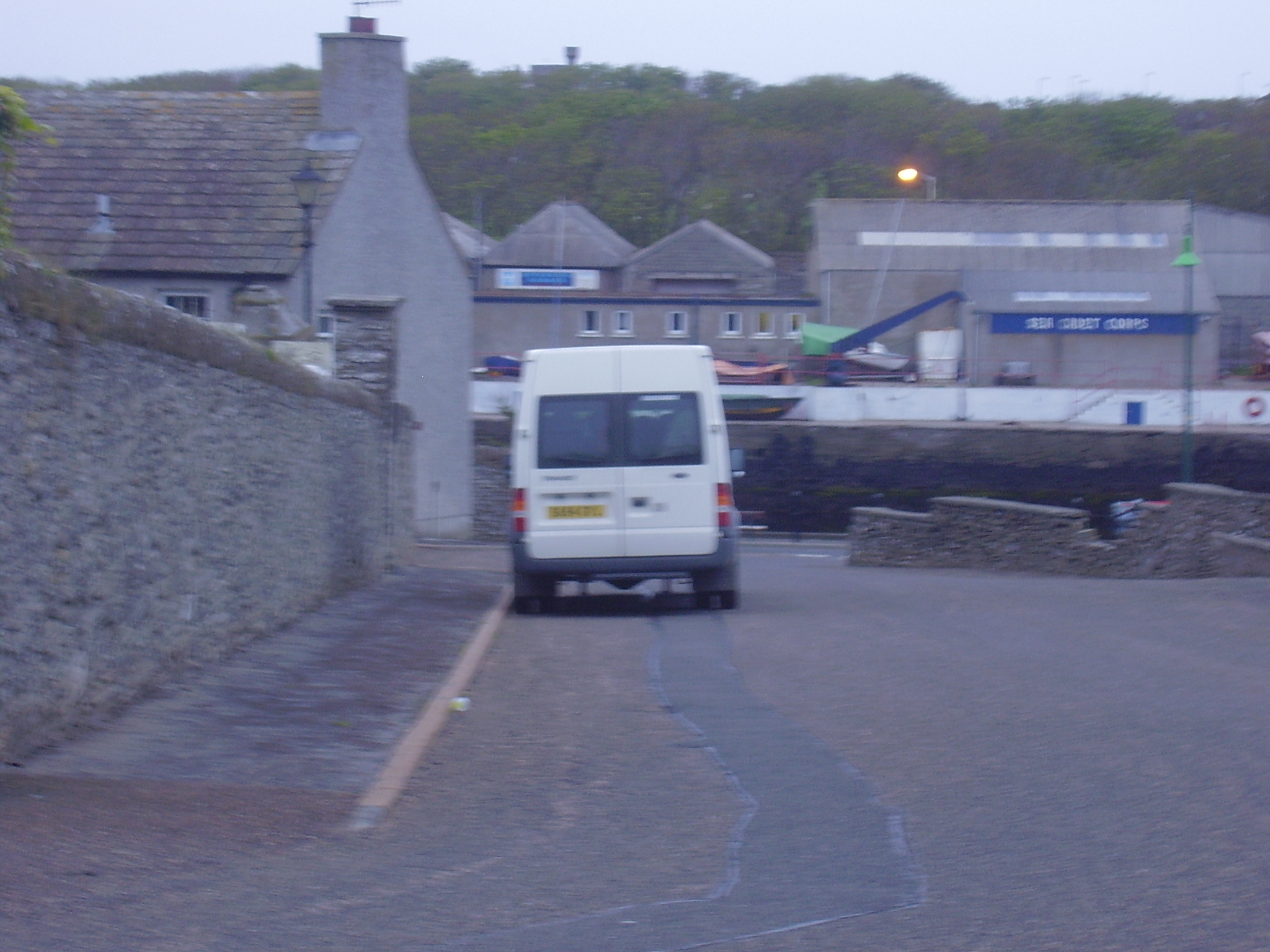 Van by Kirkyard Wall, near River